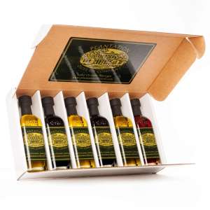 An open white box including six 60ml gourmet olive oil & vinegar bottles is displayed against a white background.